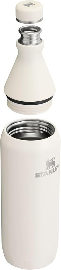 Stanley All Day Slim Bottle 20 oz | Twist On Lid with Leakproof Seal | Slim Design for Travel & Gym | Insulated Stainless Steel | BPA-Free | Cream