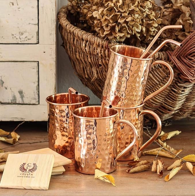 Gift Set Pure Copper Hammered Mugs with Copper Straws & Wooden Coasters Set of 4 - PREMIUM QUALITY -16 Oz Copper Mug - 100% Handcrafted - A Gift Pack for your loved Ones.