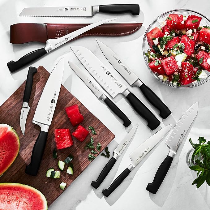 ZWILLING Four Star 7-inch Hollow Edge Santoku Knife